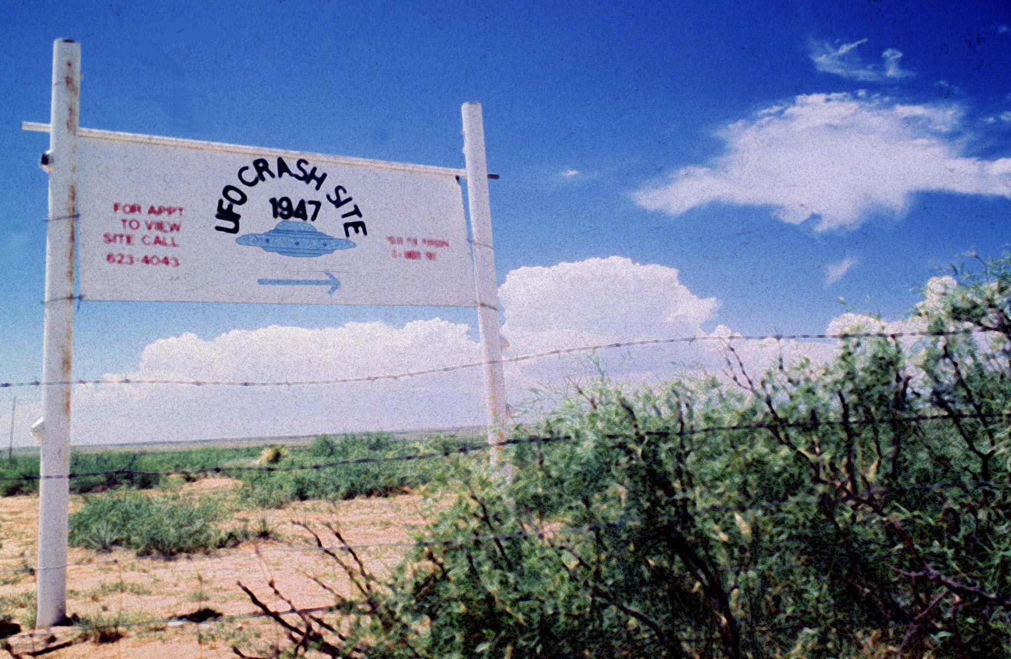 A sign off route U.S. 285, north of Roswell, New Mexico, points west to the alleged 1947 crash site of a flying saucer on the Corn Ranch